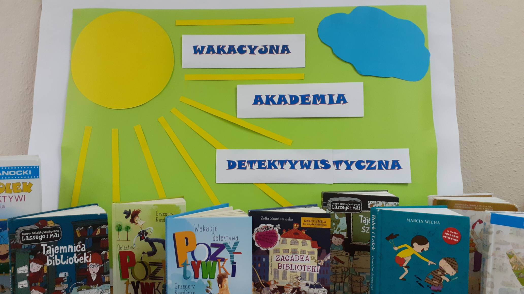 Wakacje w bibliotece - plakat